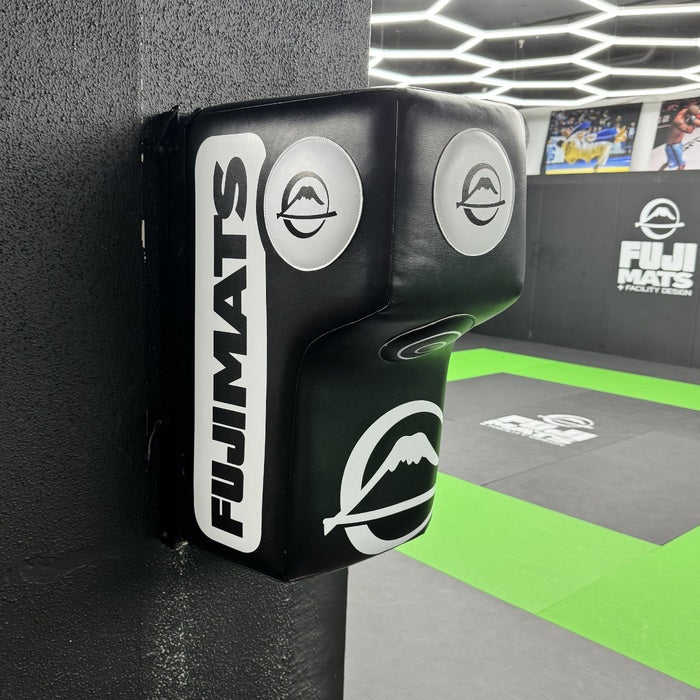 Fuji Adjustable Hook and Uppercut Wall Unit mounted in an MMA Gym