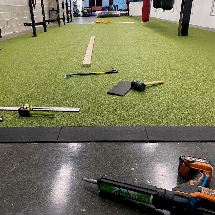 Legend 15mm Gym Tile Ramps installation against Gym Turf