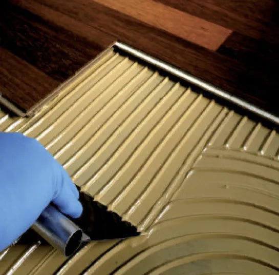 Mapei Ultrabond Eco S955 1K Wood Floor Adhesive being applied
