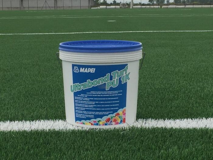 Mapei Ultrabond Turf PU 1K - 15kg tub on pitch